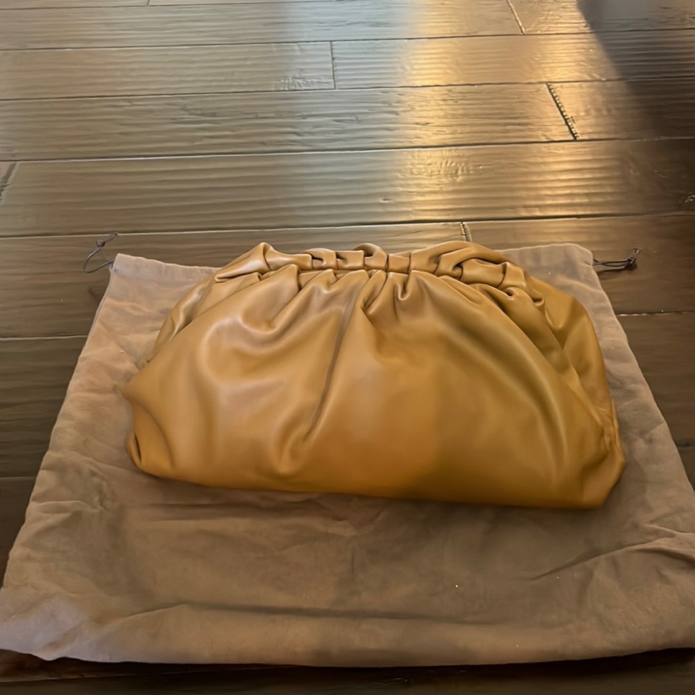 Like new condition. Bottega Veneta Carmel large pouch in care bag
